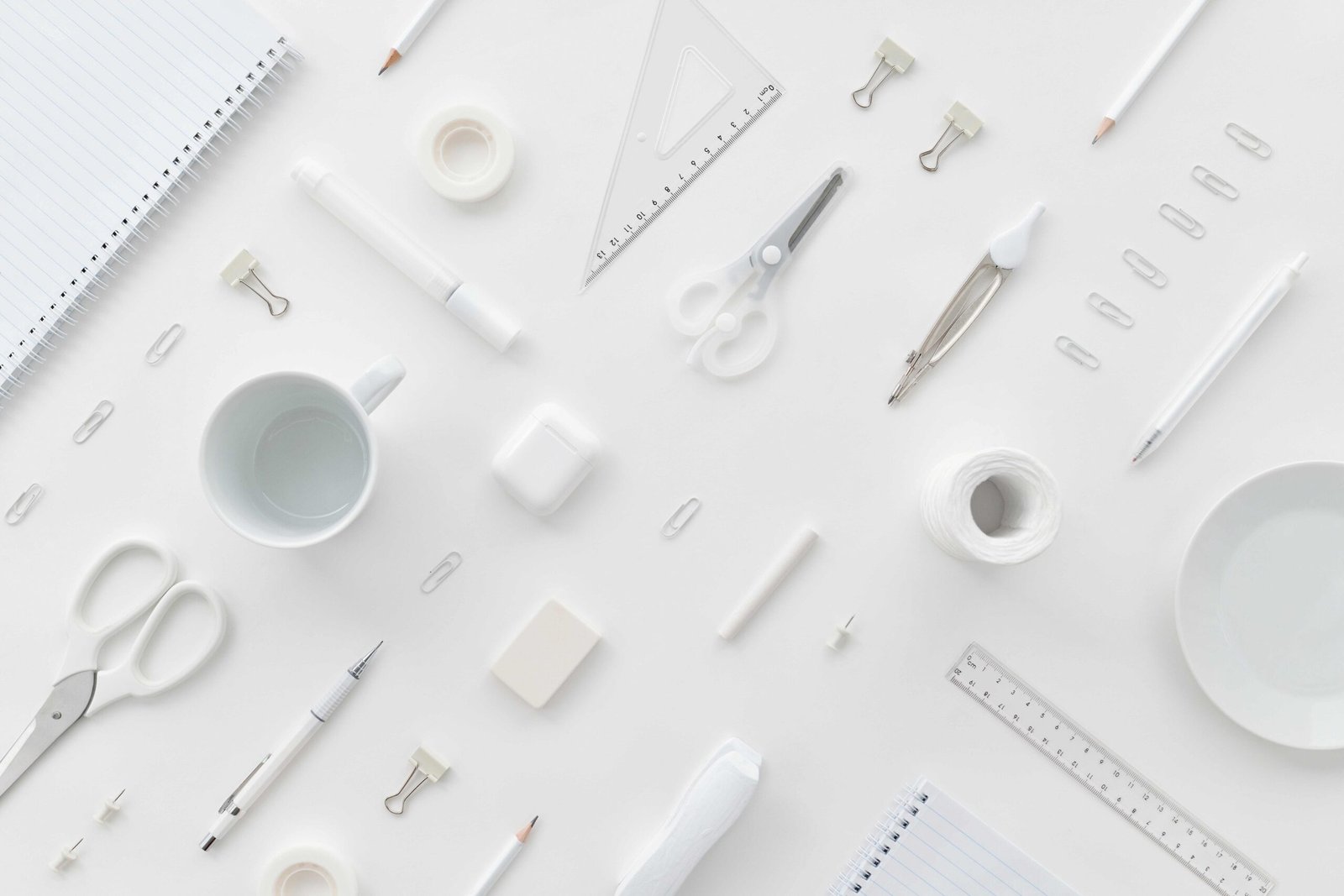 CodeWord Communications - writing graphic with white flatlay